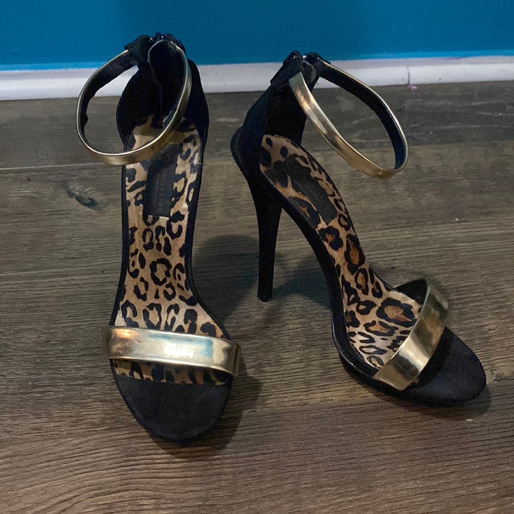 Black and gold high heels